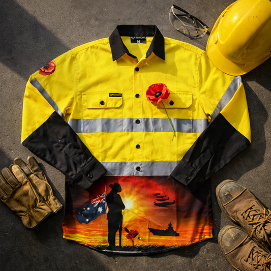 Courage Yellow Half Button Day/Night Hi Vis Workshirt with hard hat, gloves, and boots on a dark surface