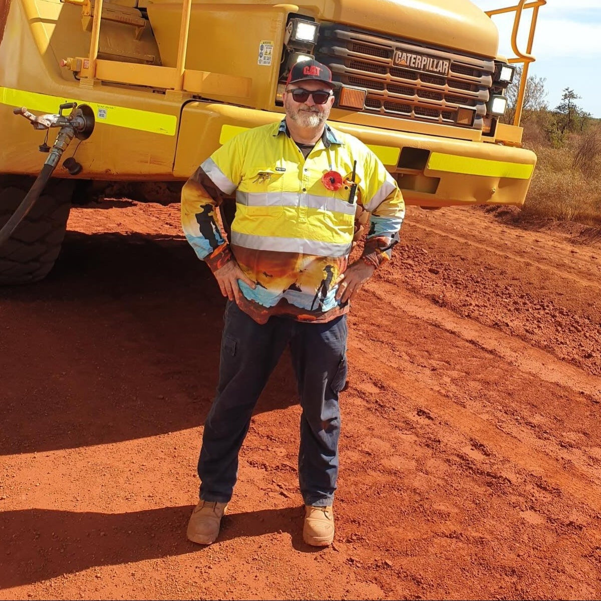 Man wearing Lest We Forget Yellow Hi Vis workwear
